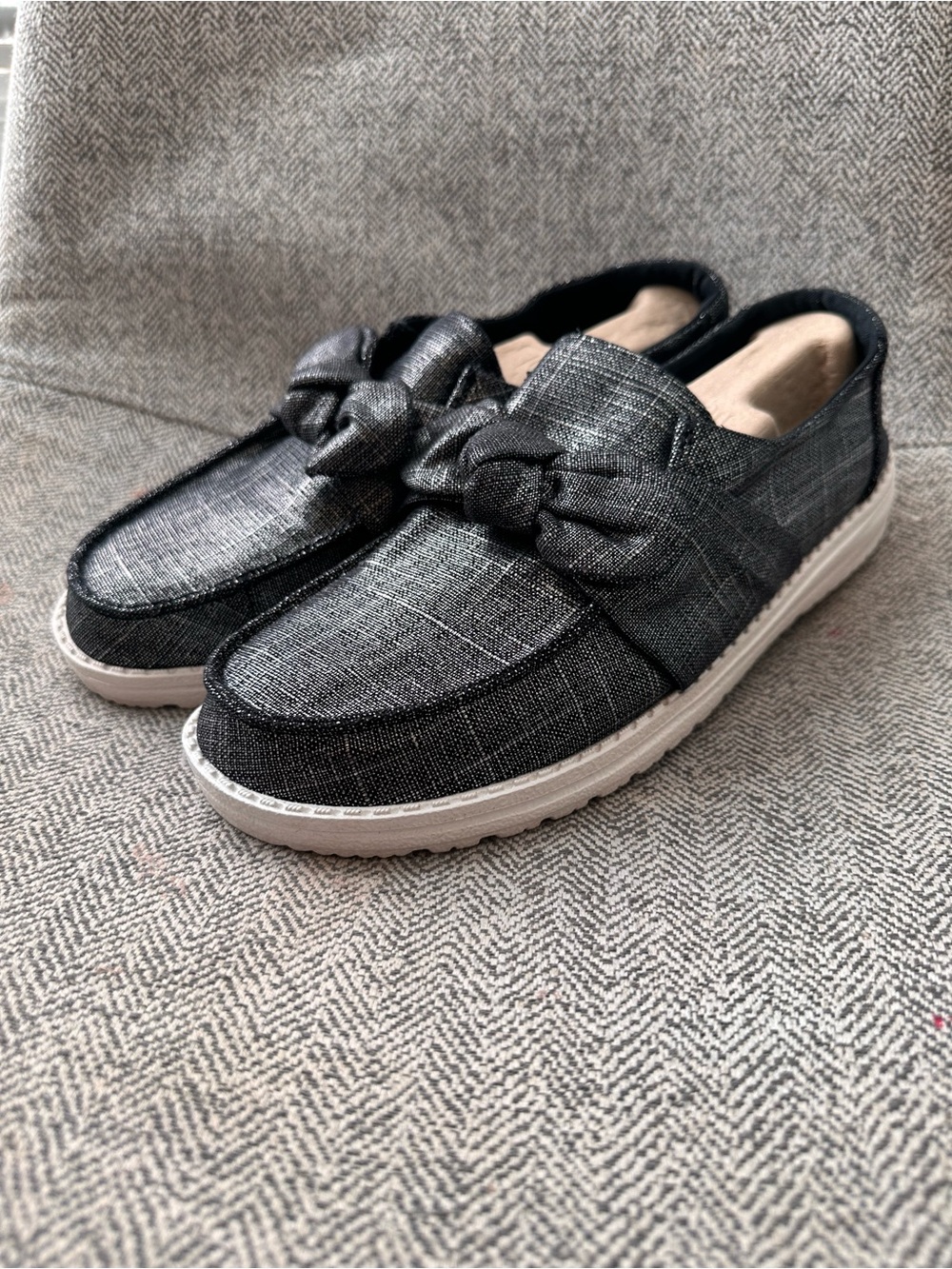 Hey Dude Women's Bow Shimmer Slip-On Loafers in Black